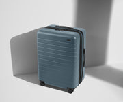 Angled product view of The Medium Flex suitcase in Coast Blue