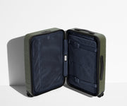 The Bigger Carry-On suitcase in Olive Green shown open in an upright position to show interior organization and compression system