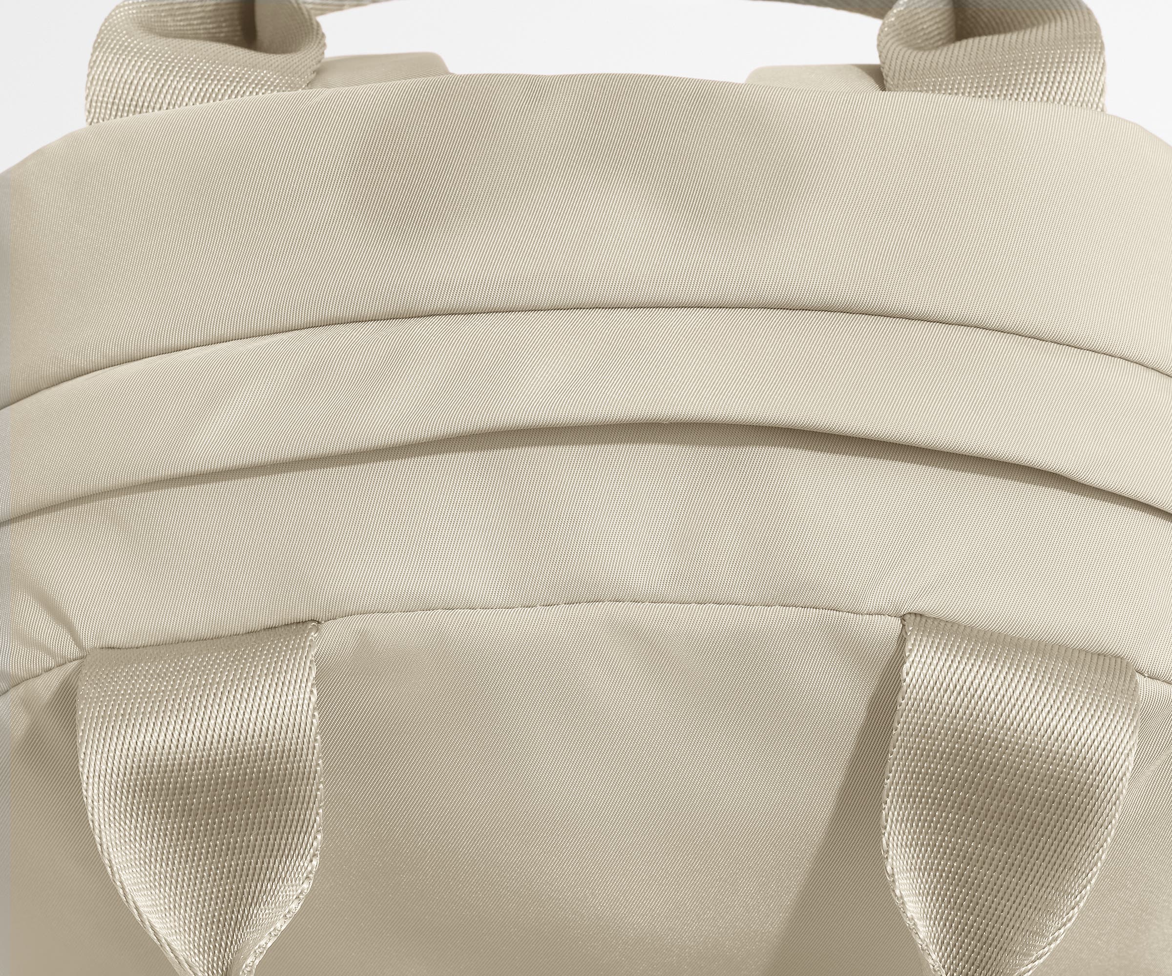 Person wearing the Featherlight Backpack in Arctic Blue