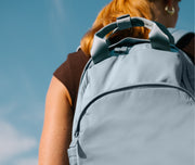 Person wearing the Featherlight Backpack in Arctic Blue