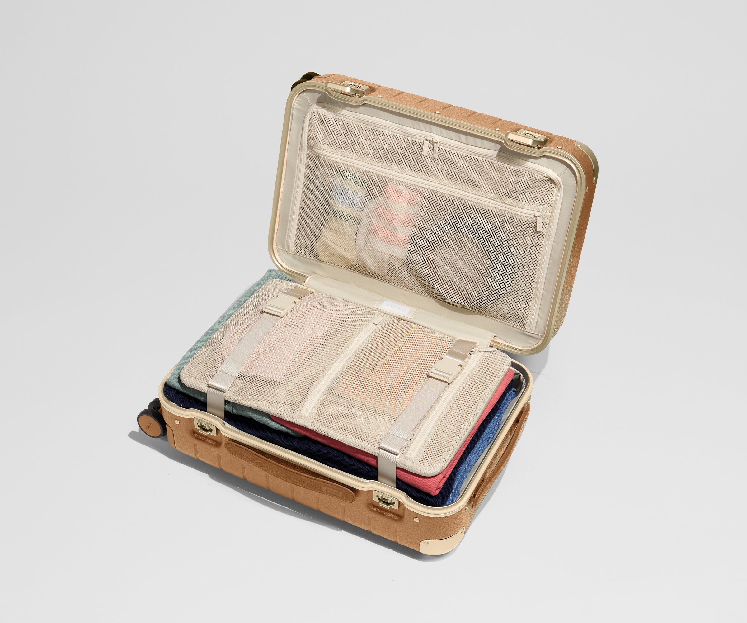 The Aluminum Edge Carry-On in Cognac Brown