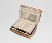 The Aluminum Edge Carry-On in Cognac Brown