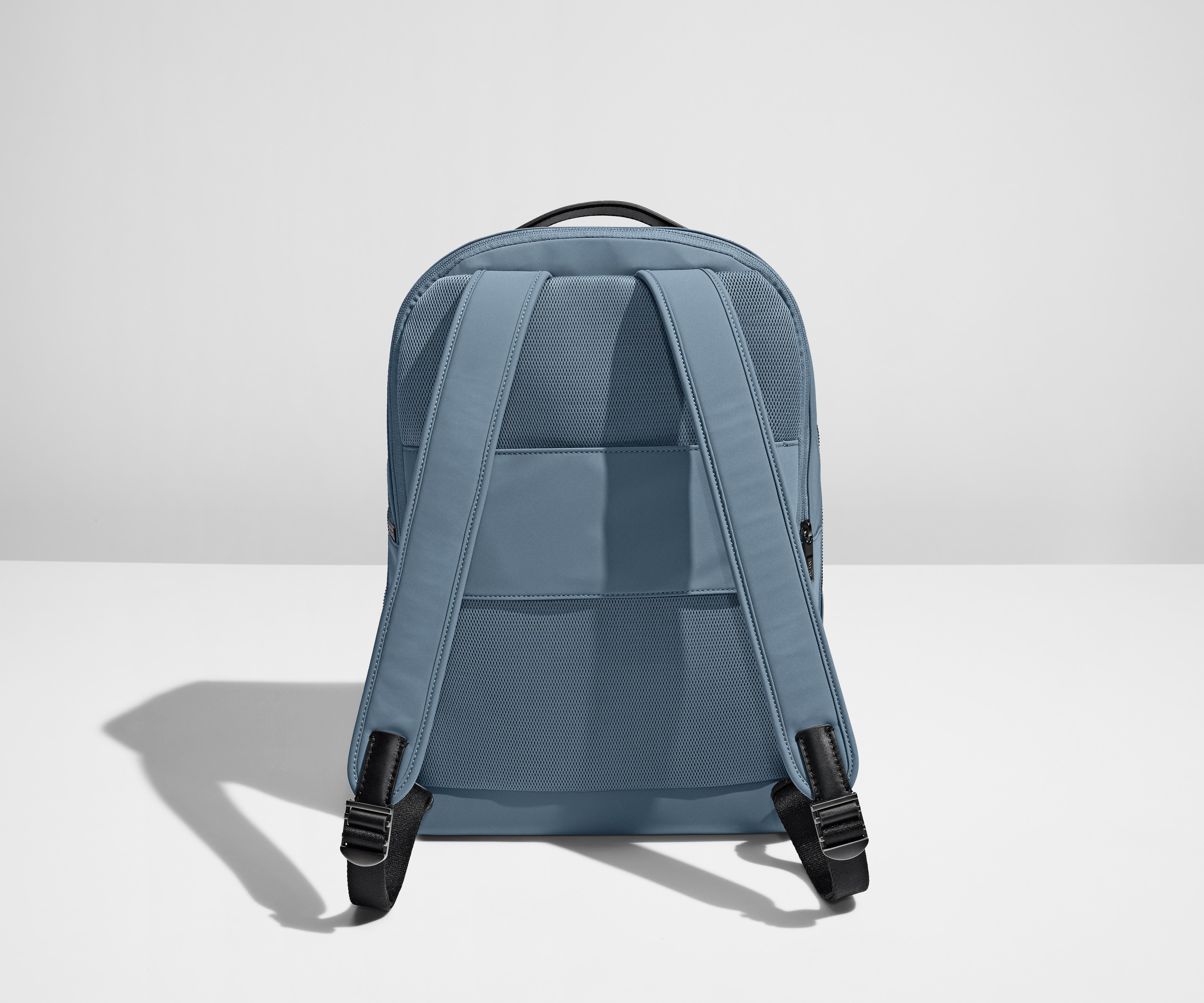 Back view of the Everywhere Zip Backpack showing the padded shoulder straps and trolley sleeve